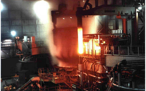 Electric arc furnace glowing in a Luxembourg steel mill, illustrative, not the Louisiana site