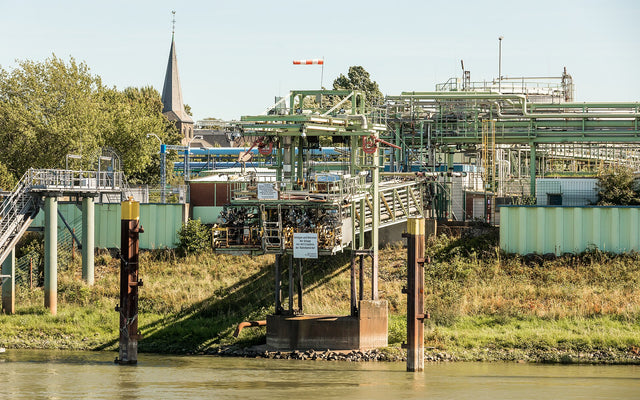 Stand-in Chempark Leverkusen industrial waterfront — illustrative only, not Covestro Vulkollan pilot equipment