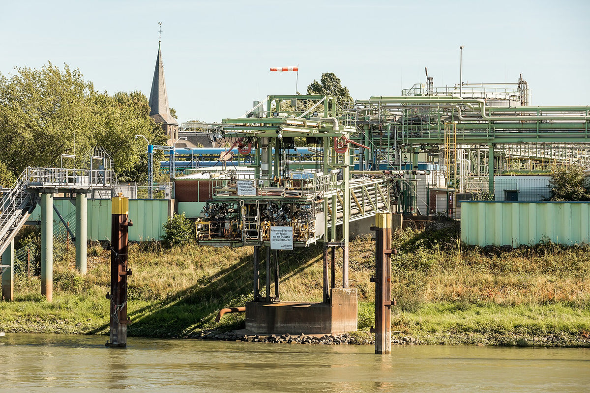 Stand-in Chempark Leverkusen industrial waterfront — illustrative only, not Covestro Vulkollan pilot equipment
