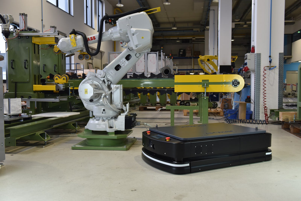 Stand-in warehouse automated guided vehicle carrying a load — illustrative only, not an ACTIVE Shuttle or NEURA product