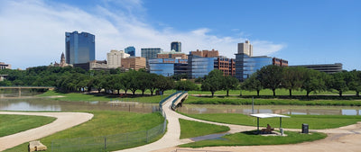 Downtown Fort Worth skyline across the Trinity River, illustrative of the competing city, not the Carter Crossing plant site
