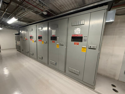 Indoor medium-voltage electrical switchgear cabinets — stand-in, not an IEM product and not the San Antonio plant