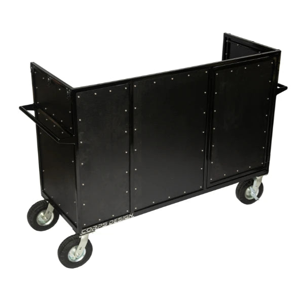 Corps Design Enclosed Synth Cart with Shock-mount 12U Rack – FCSYNTH-X12, 24” x 60” Carpeted Top Deck, Removable Lid, Custom Power Pass-throughs, 8” Super Casters – Ideal for Electronics and Amplifier Storage Corps Design Logo - We Move Music